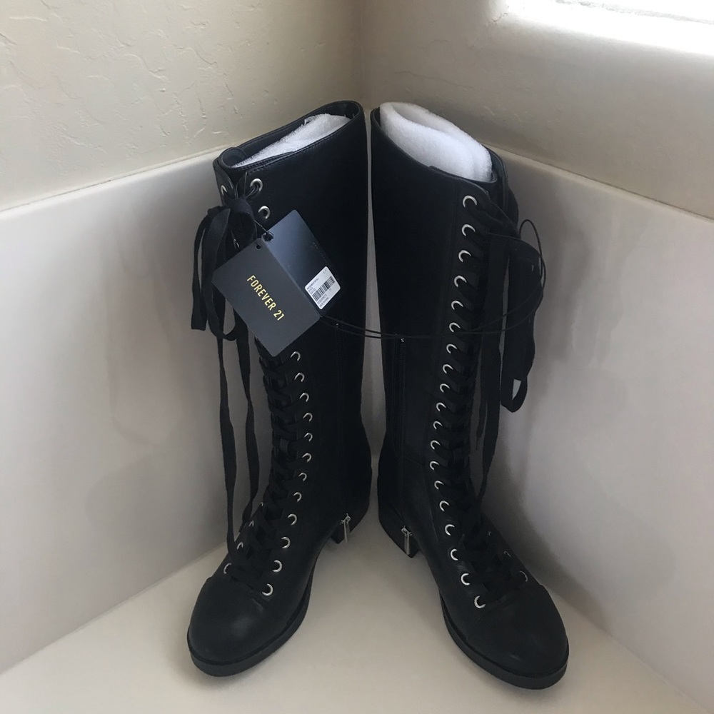 Black knee height combat boots